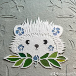 ハリネズミとアネモネの切り絵